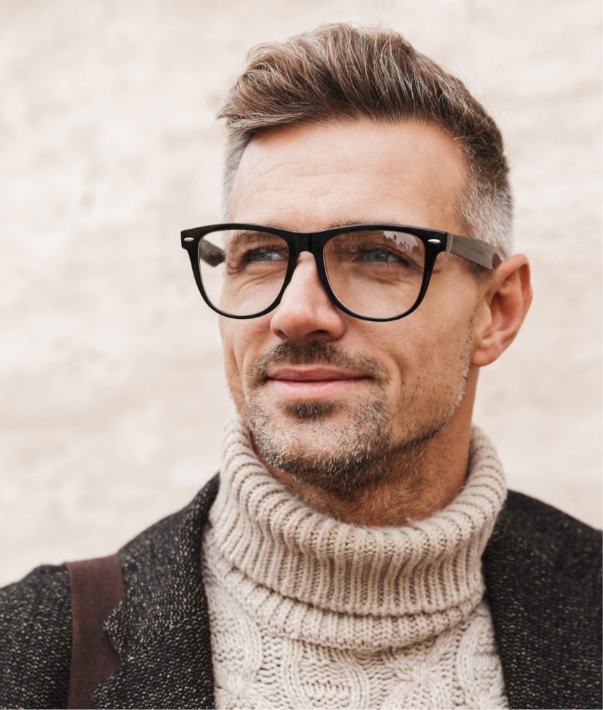 Photo of a fashionable middle age man wearing glasses